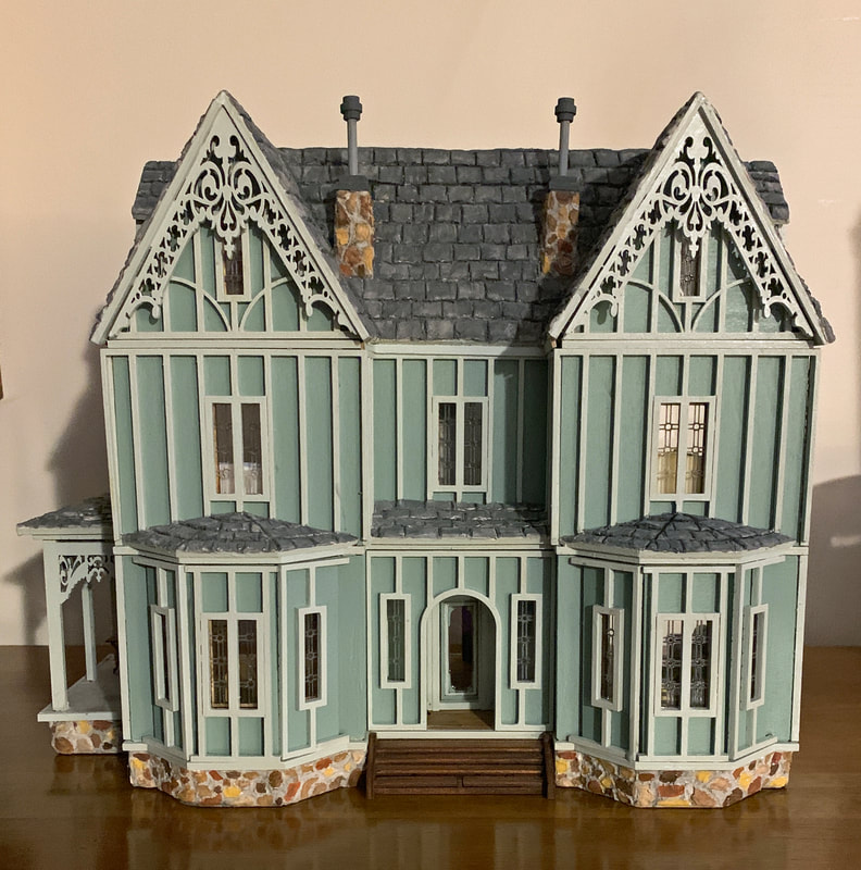 DOLLS HOUSE BRICK & TUDOR DOLLS HOUSE DECORATED ON OUTSIDE 12TH SCALE 